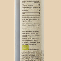 Aimilios Organics 500ml Bio Olivenöl closeup foto links vom Etikett auf Kraftpapierbraunem Hintergrund