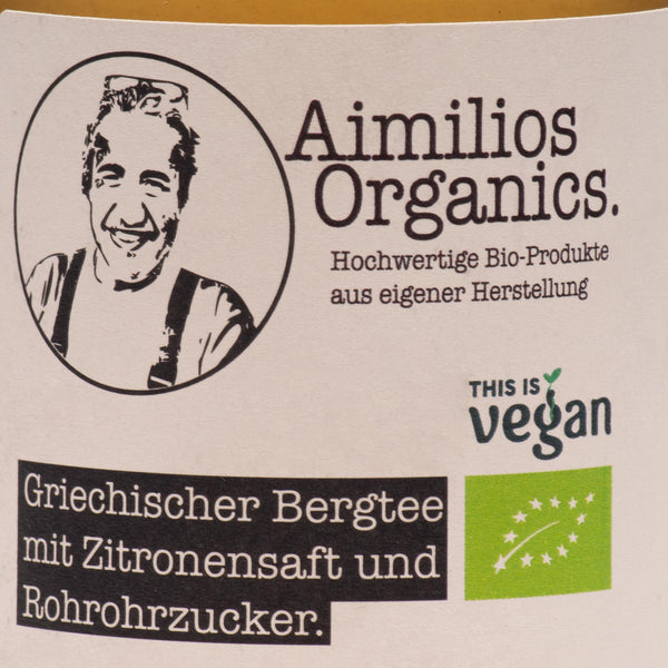 Produktfoto (Nahaufnahme front) Aimilios Organics Berg-Eistee in der 0,33l Flasche